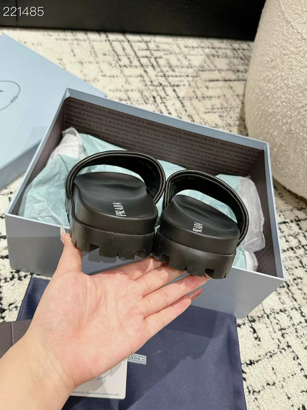PRADA 25S PADDED SLIDES IN BLACK CALFSKIN WITH LOGO