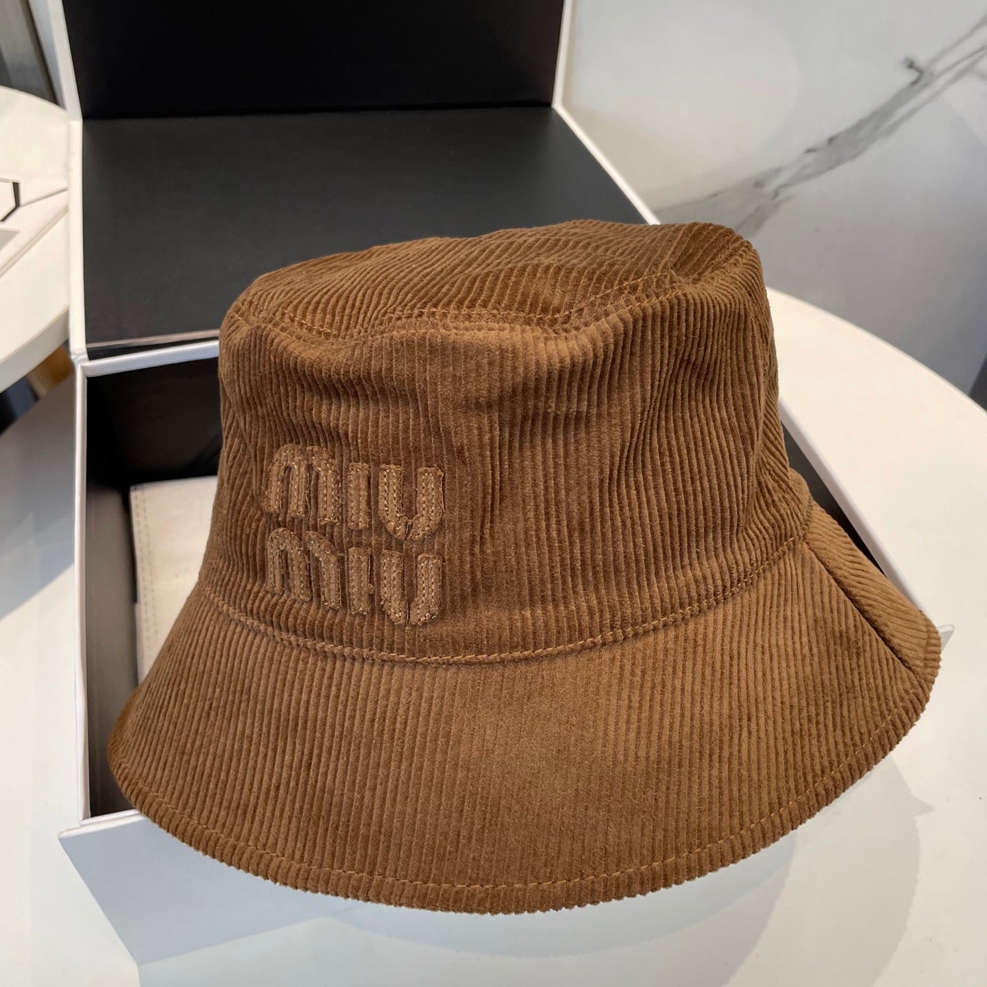 MM BUCKET IN BURNT ORANGE VELVET WITH LOGO